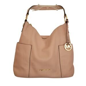 Large Michael Kors Purse Outside pockets on each end Bag Charm